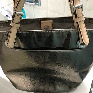 MK purse with wear and tear on handles